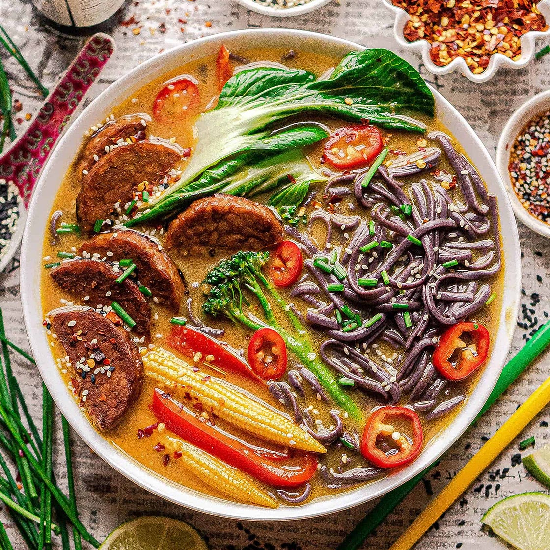 Thai yellow curry soup with tempeh and black soba noodles