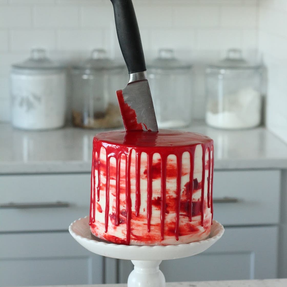 Halloween Bloody Knife Cake (Red Velvet Cake with Almond Cream Cheese Buttercream) - Baking with Blondie