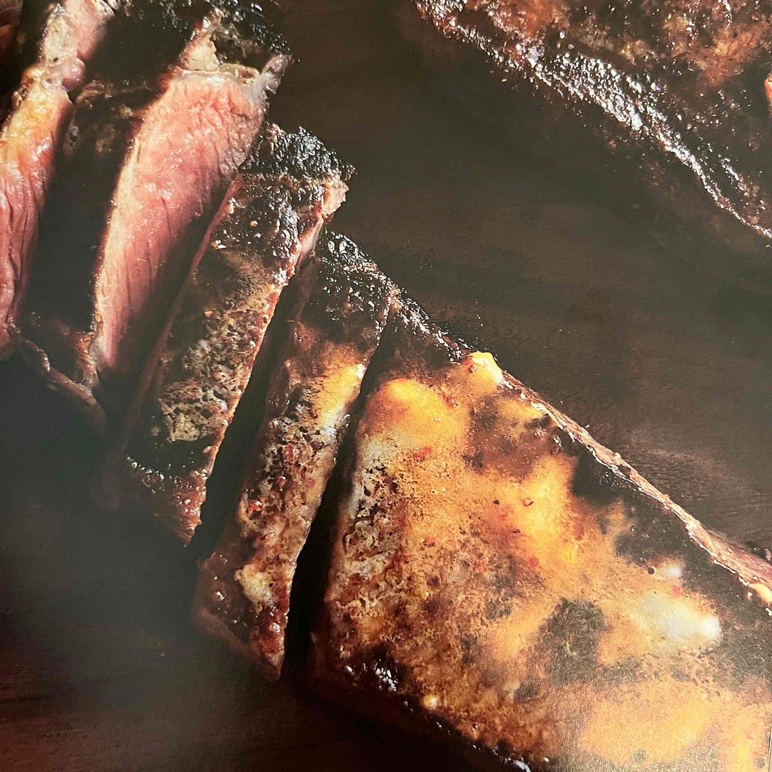 Strip Steak with Harissa Butter and Parsley Salad