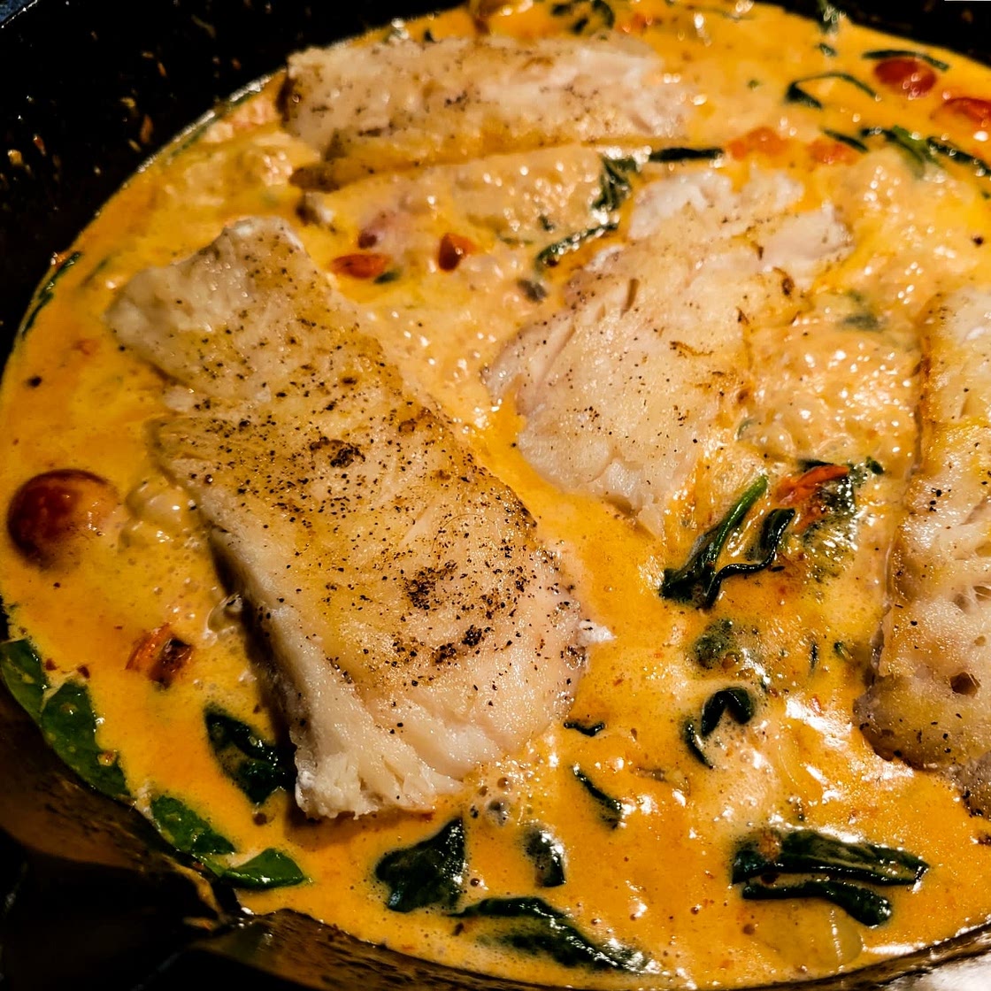 One-Pan Spinach and Artichoke Salmon with Tomatoes