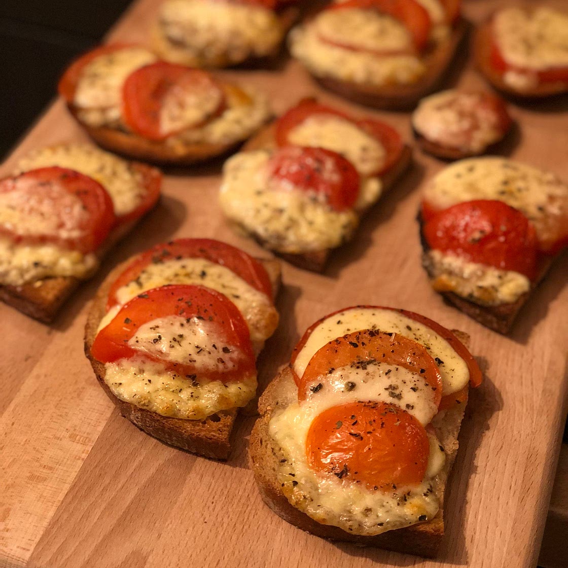 Fried bread with mozzarella and tomato.