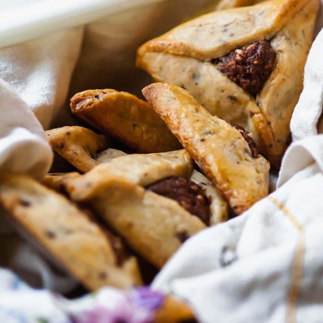 chocolate and rosemary hamantaschen with halva ganache