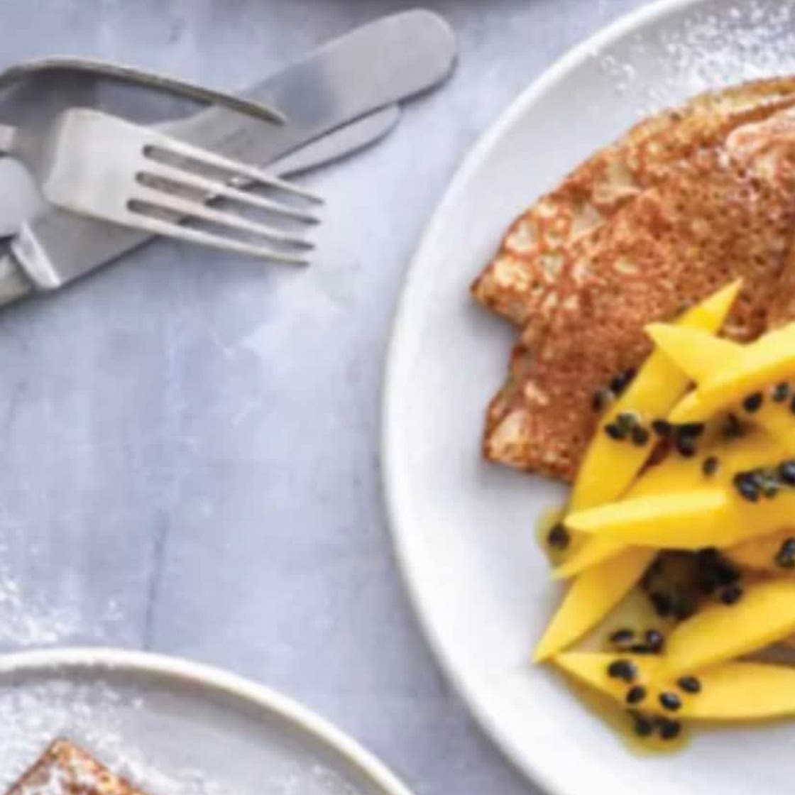 Cardamom pancakes with mango and passion fruit