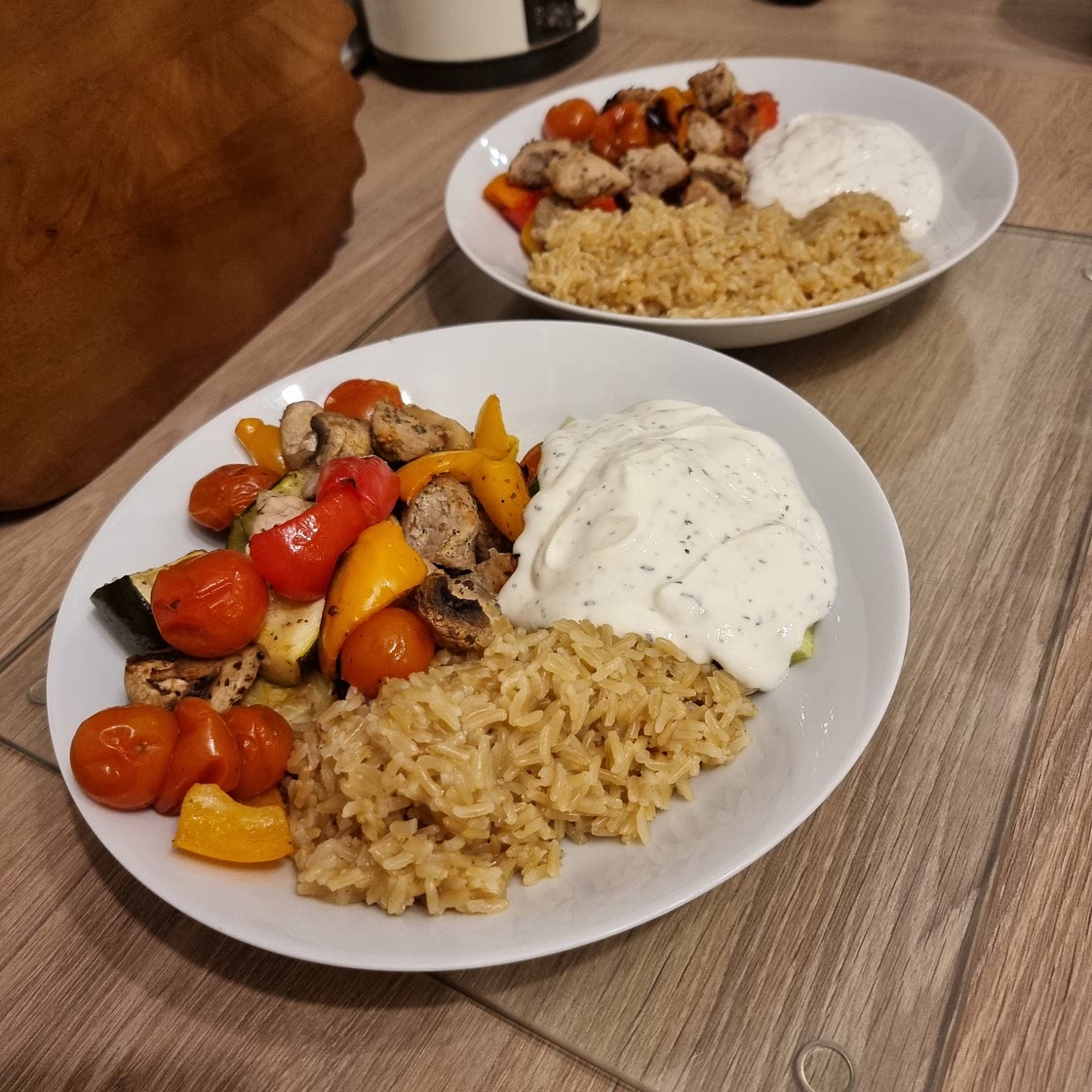 Pork souvlaki traybake with tzatziki and rice