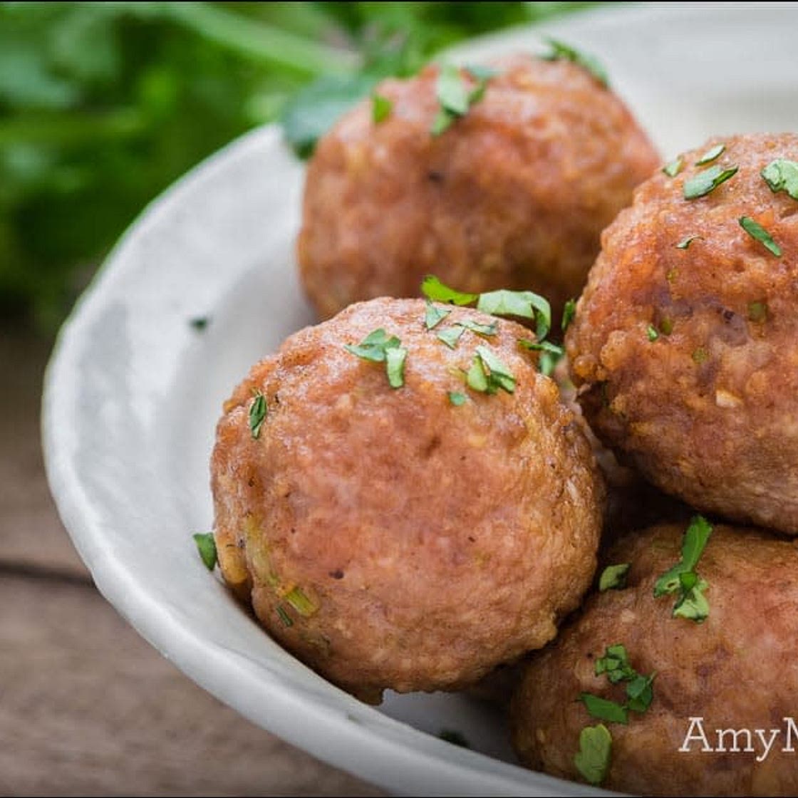 Turkey Meatballs over Spaghetti Squash with Tuscan Kale Pesto
