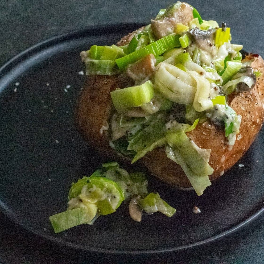 Humble jacket potato with mushrooms, leeks and cheddar cheese