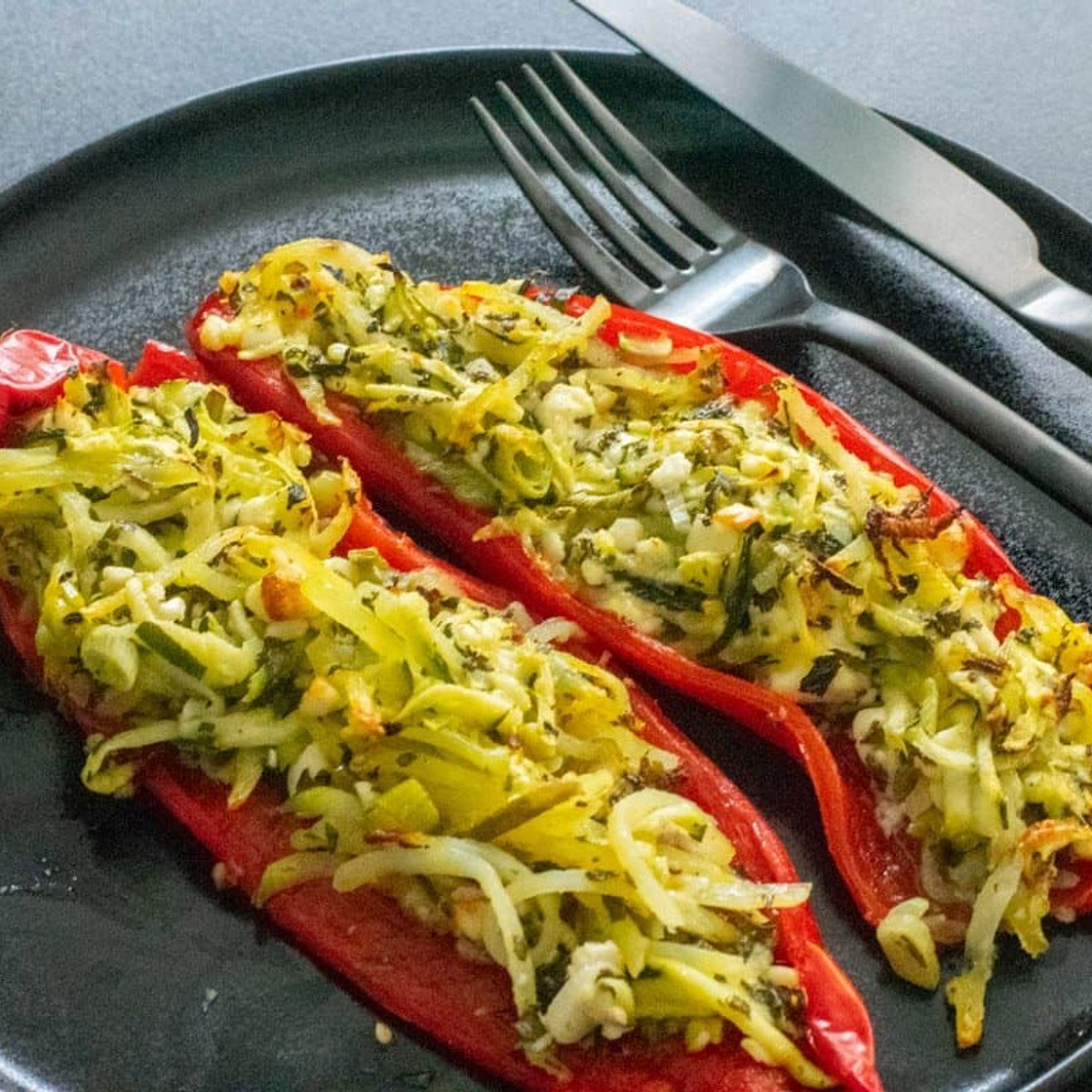 Stuffed romano peppers with courgette, mint and feta