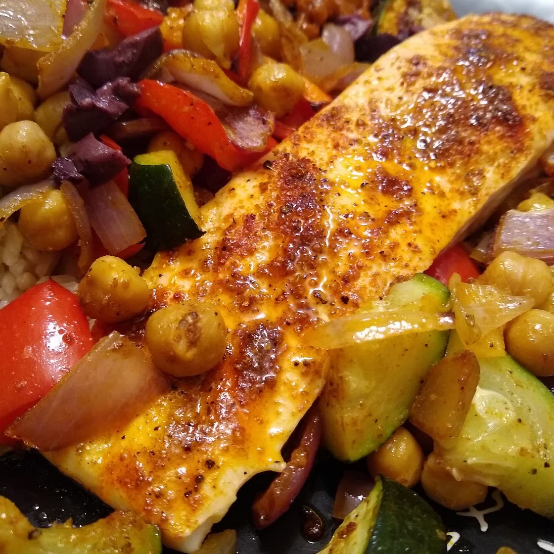 Roasted salmon with chickpeas, zucchini, and red pepper