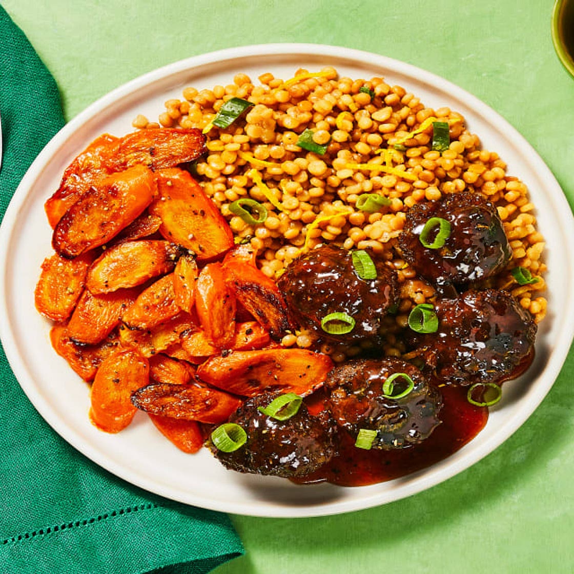 Tunisian-Spiced Meatballs with an Apricot Glaze, Roasted Carrots & Scallion Couscous