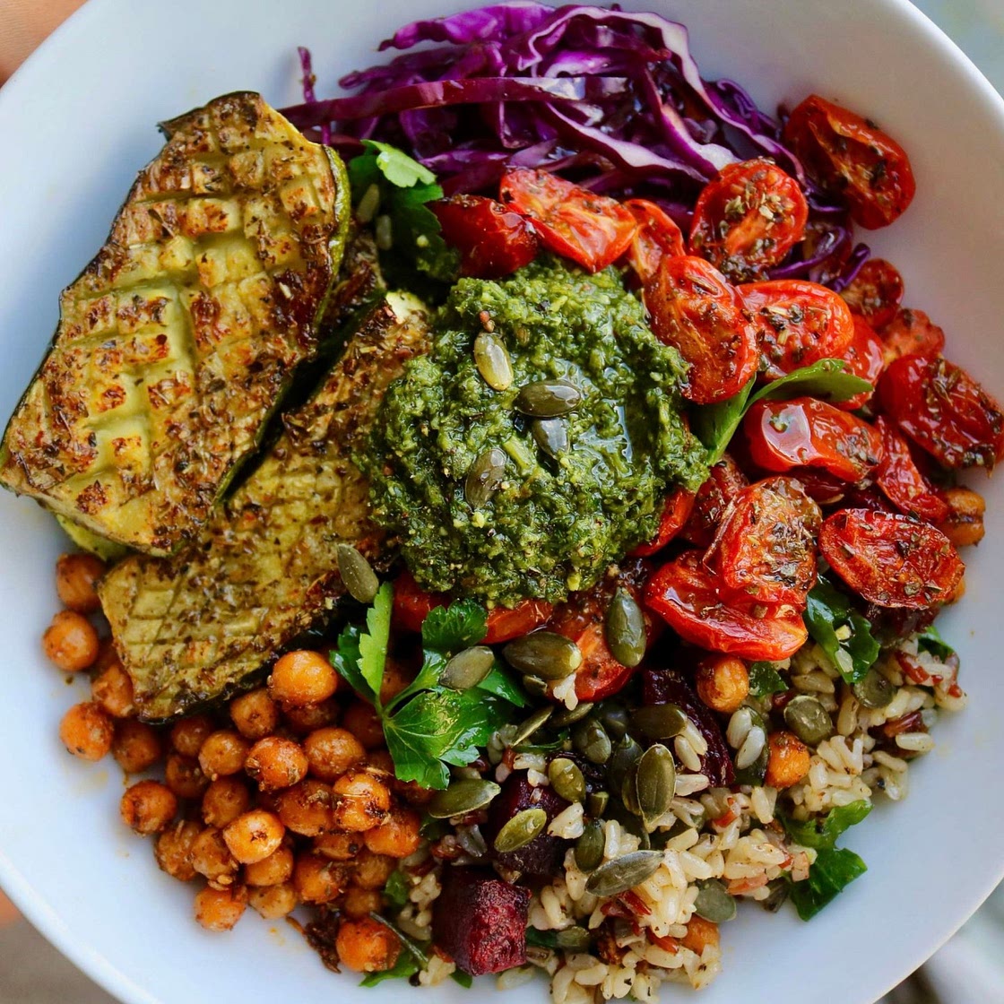 Beet rice, rosemary courgette, roasted tomatoes, zhoug bowl