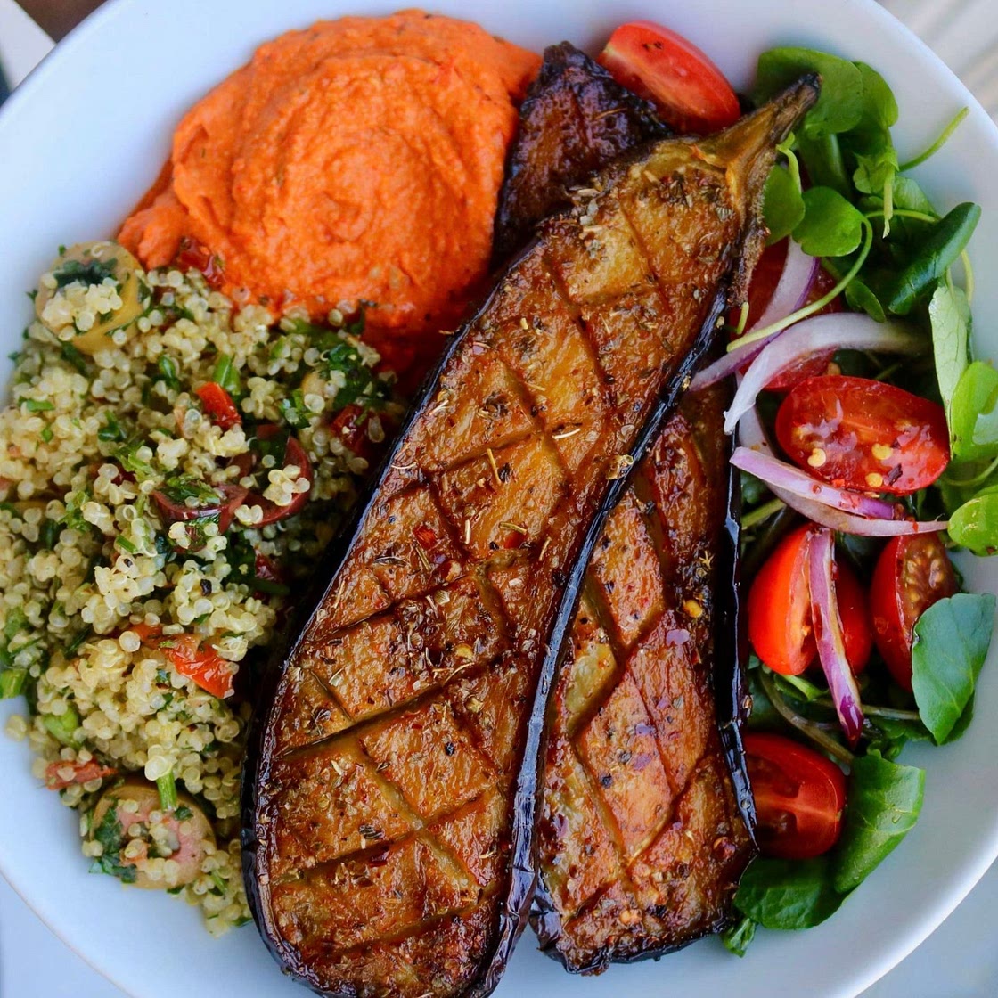 Harissa pepper hummus, tomato & olive quinoa, Aubergine bowl