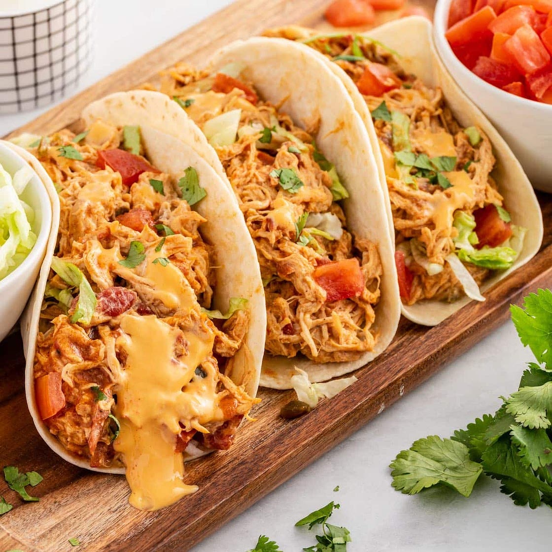 Slow Cooker Queso Chicken Tacos