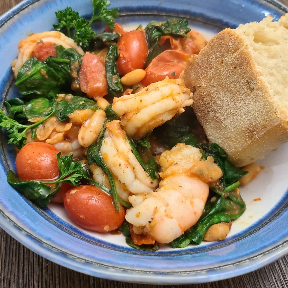 Garlicky Sautéed Shrimp with Creamy White Beans and Blistered Tomatoes