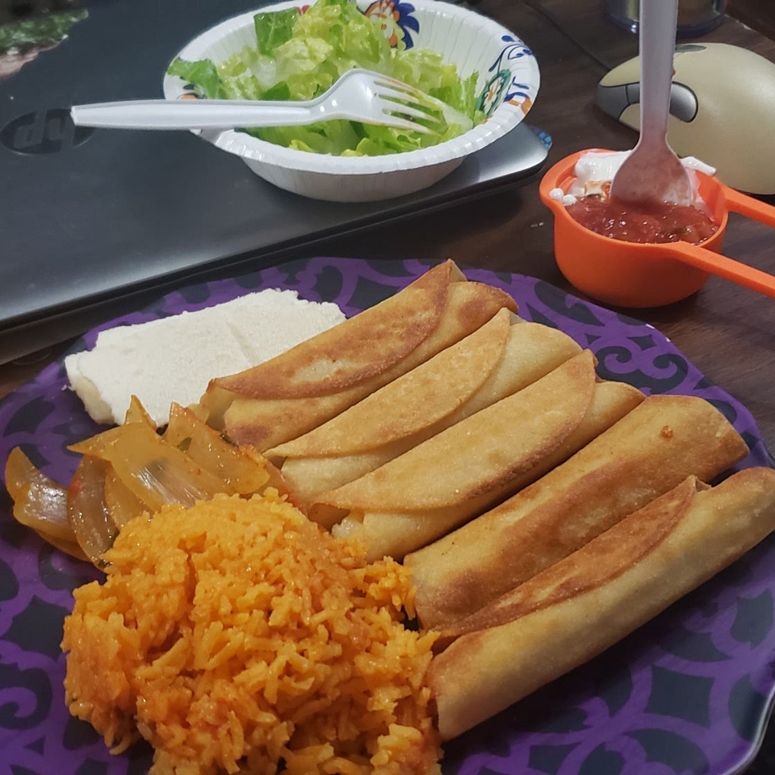 Potato taquitos & rice