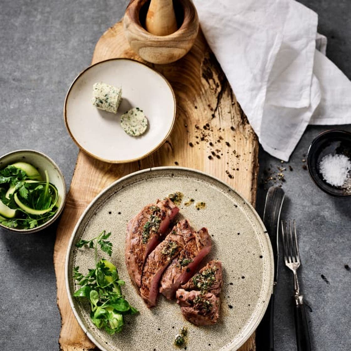 Rare beef steak with herb garlic butter