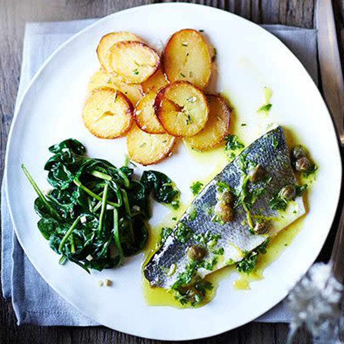 Baked sea bass with lemon caper dressing