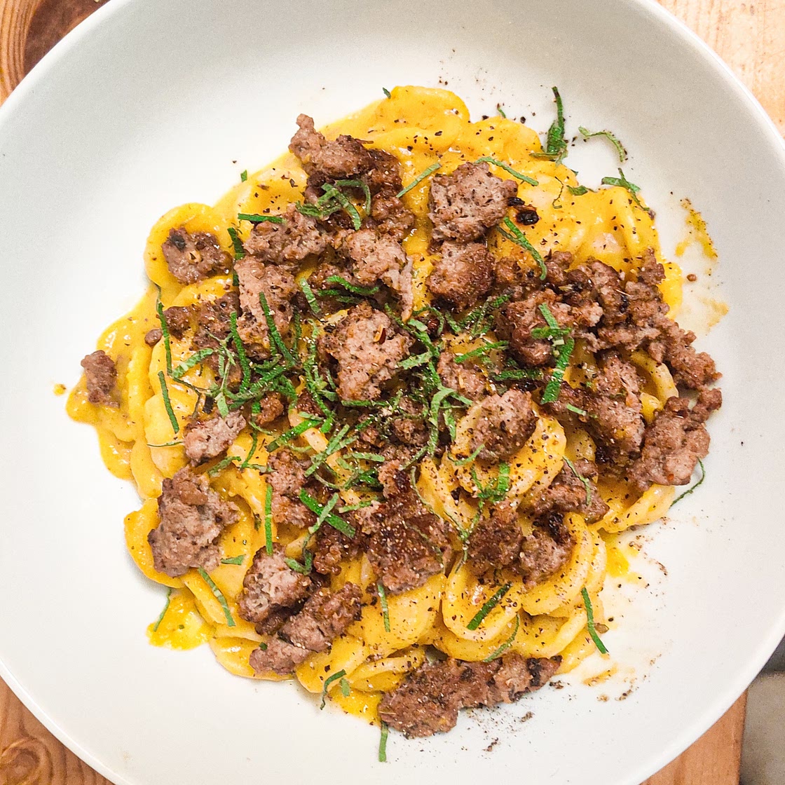 Orecchiette with pumpkin sauce and fennel pork mince