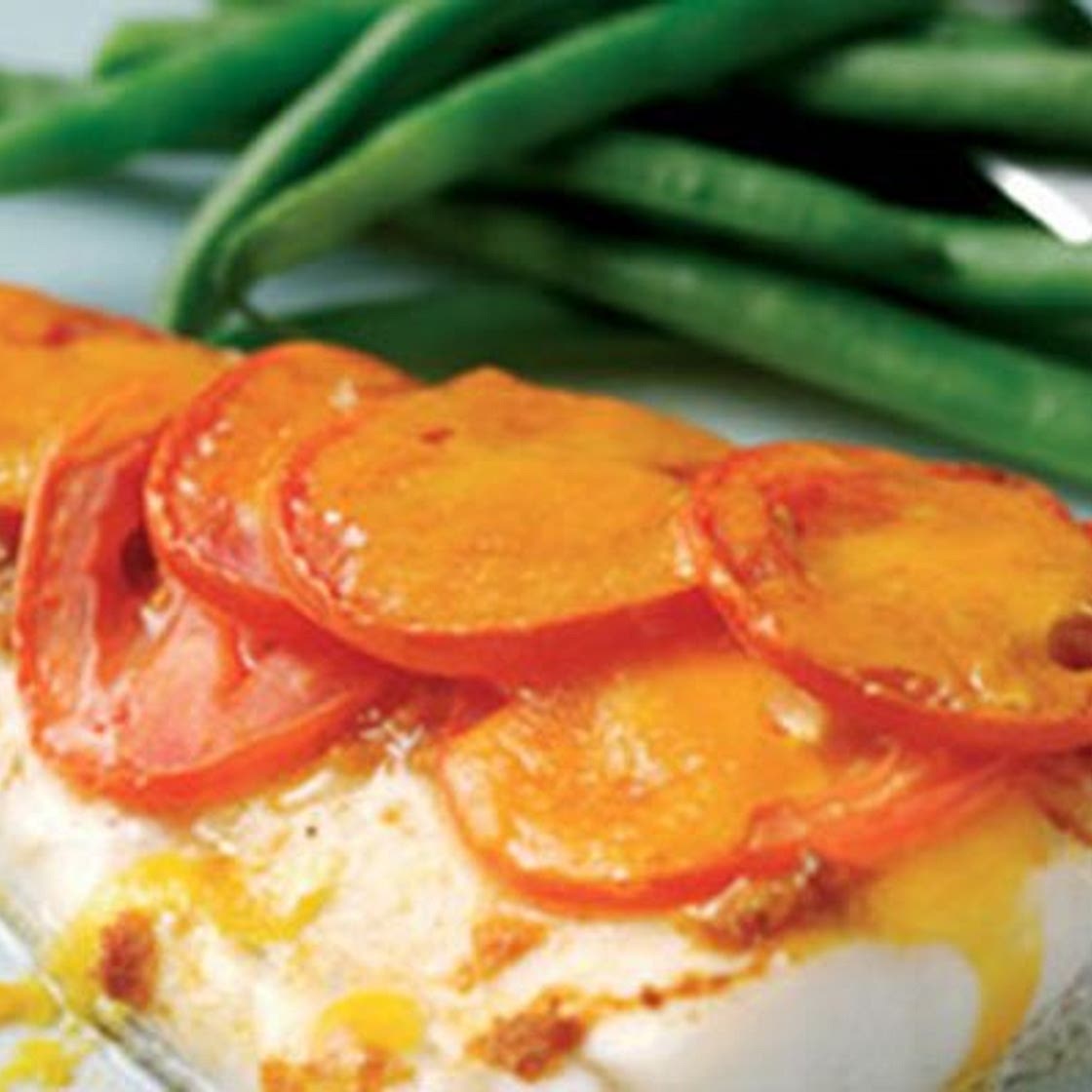 Cheese and tomato grilled fish