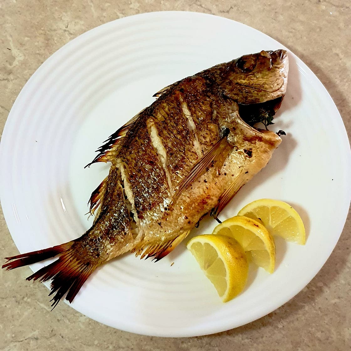 Fire roasted silver bream
