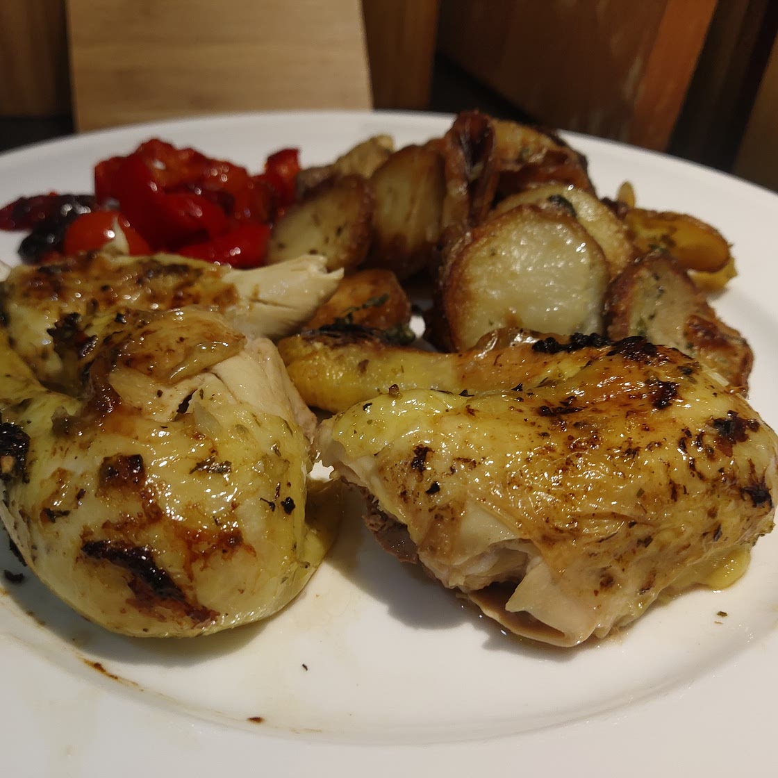 Peruvian Poussin with Sauté Potatoes & Tomato and Red Pepper