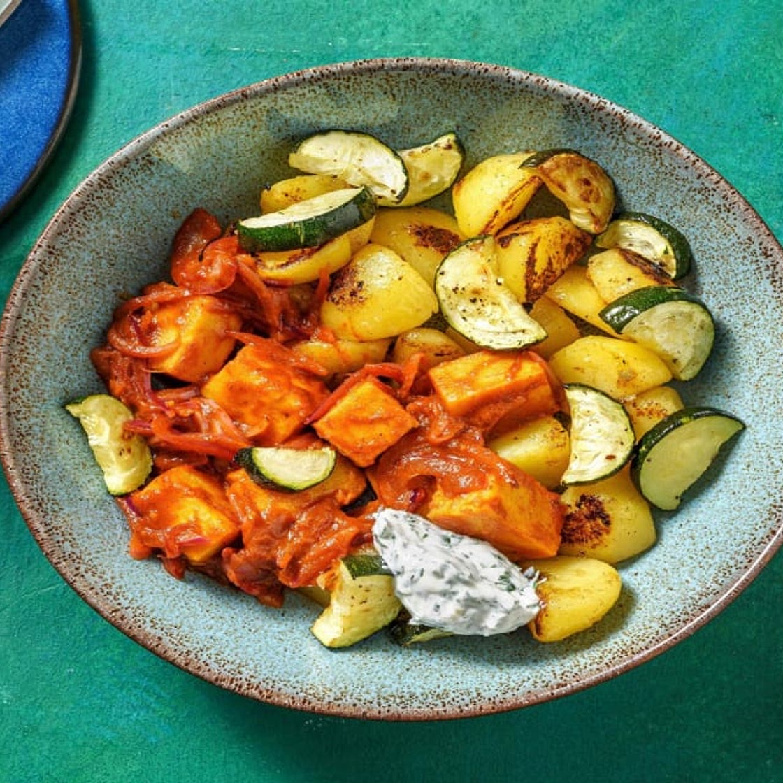 Korma-Curry mit Kofu auf Zucchini-Kartoffel-Gemüse mindestens -20% Kalorien im Vergleich zu den anderen Rezepten