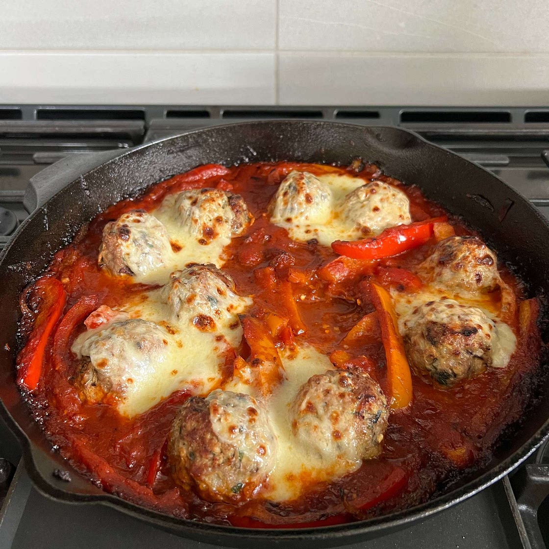 Cheesy Turkey Meatballs with Peppers and Onions