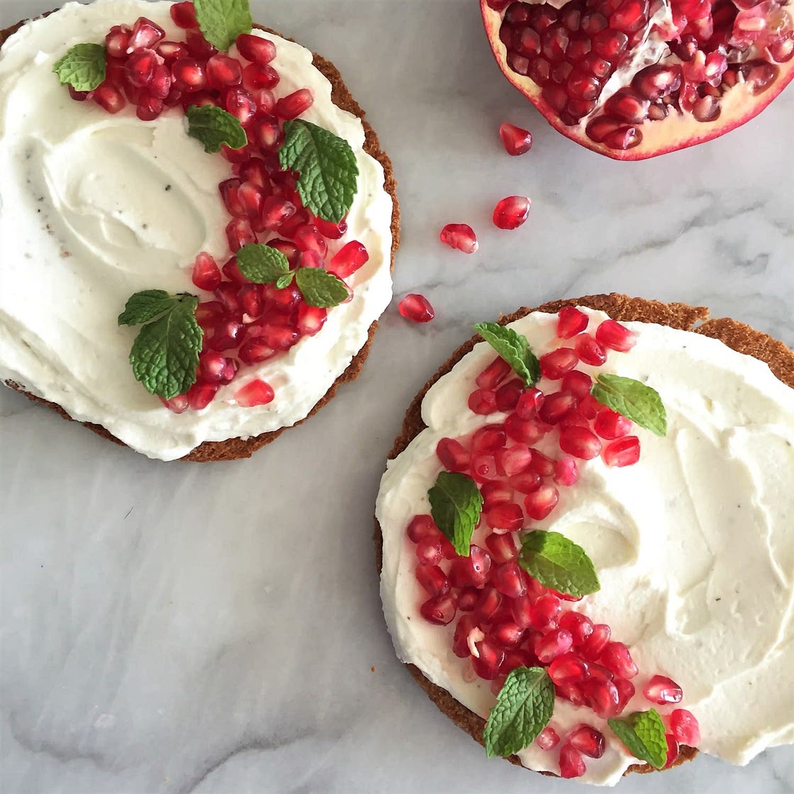 Whipped cream cheese and pomegranate toast