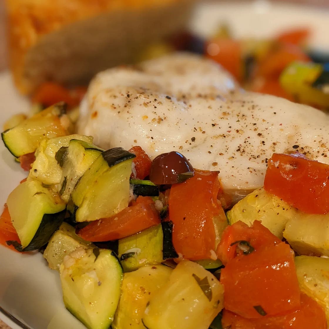 Roasted Cod with Tomatoes, Zucchini, and Olives