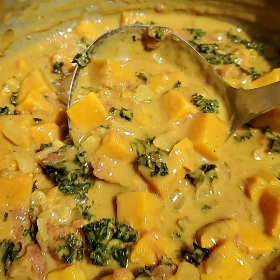 Spicy Peanut Soup with Sweet Potato + Kale