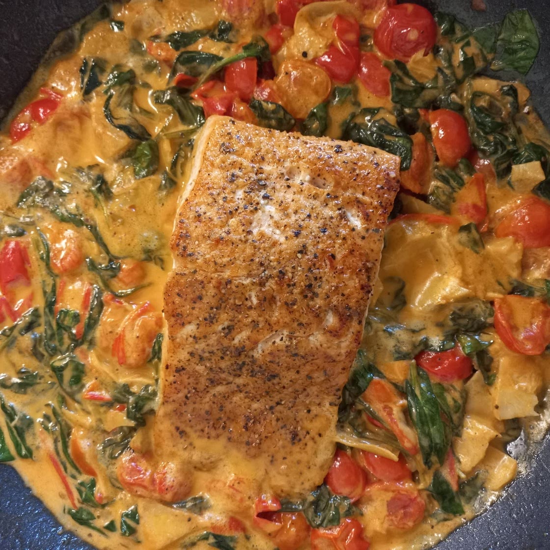 One-Pan Spinach and Artichoke Salmon with Tomatoes