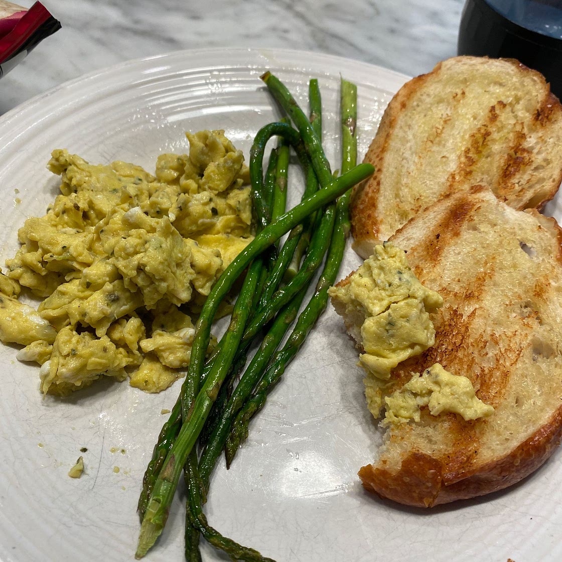 Mediterranean Scrambled Eggs with Garlic and Basil