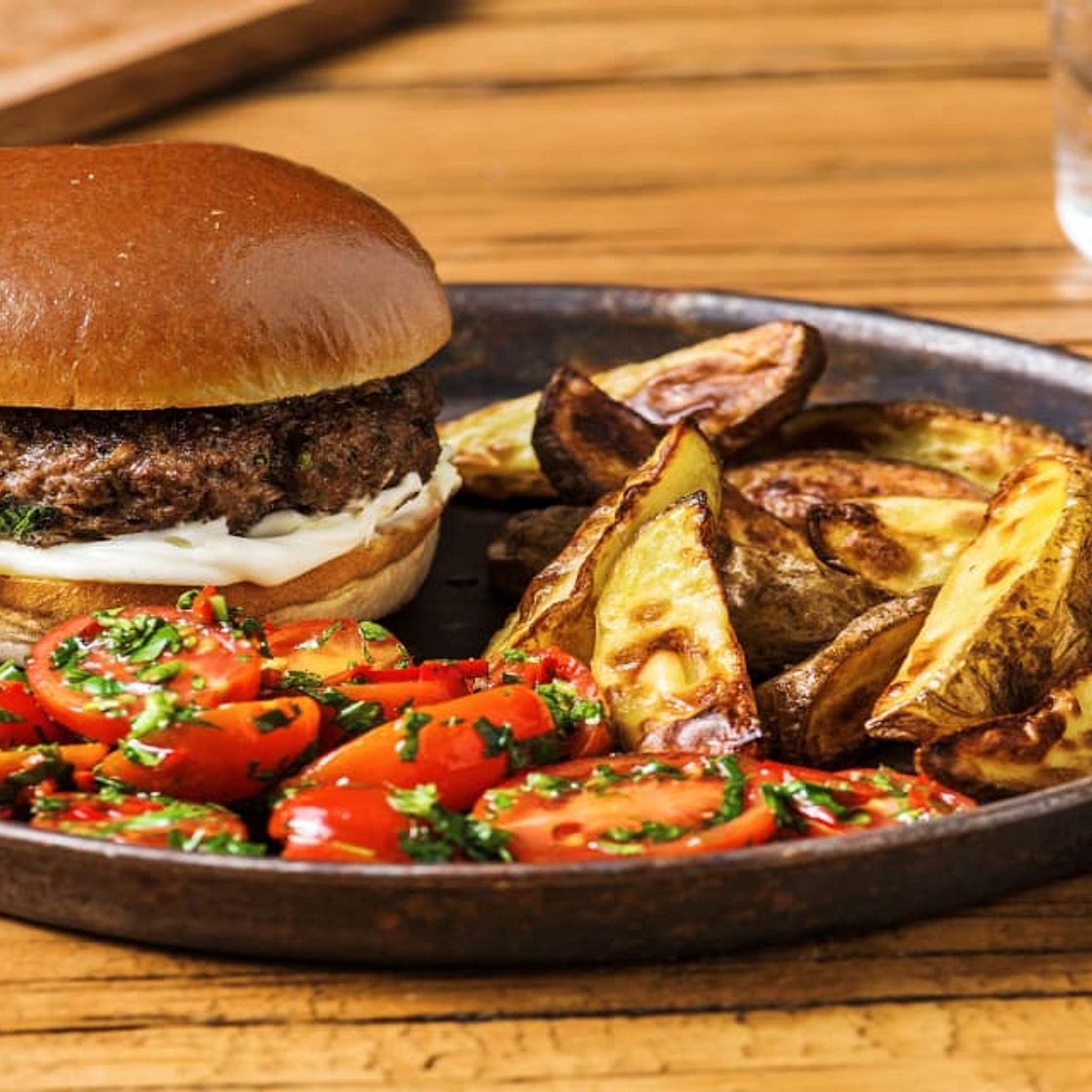 Herby Burgers and Wedges with Chimichurri Tomato Salad