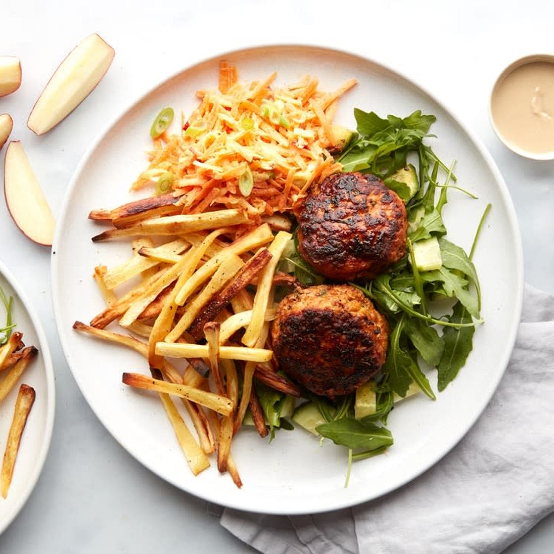Smoky pork burgers with apple & tahini slaw