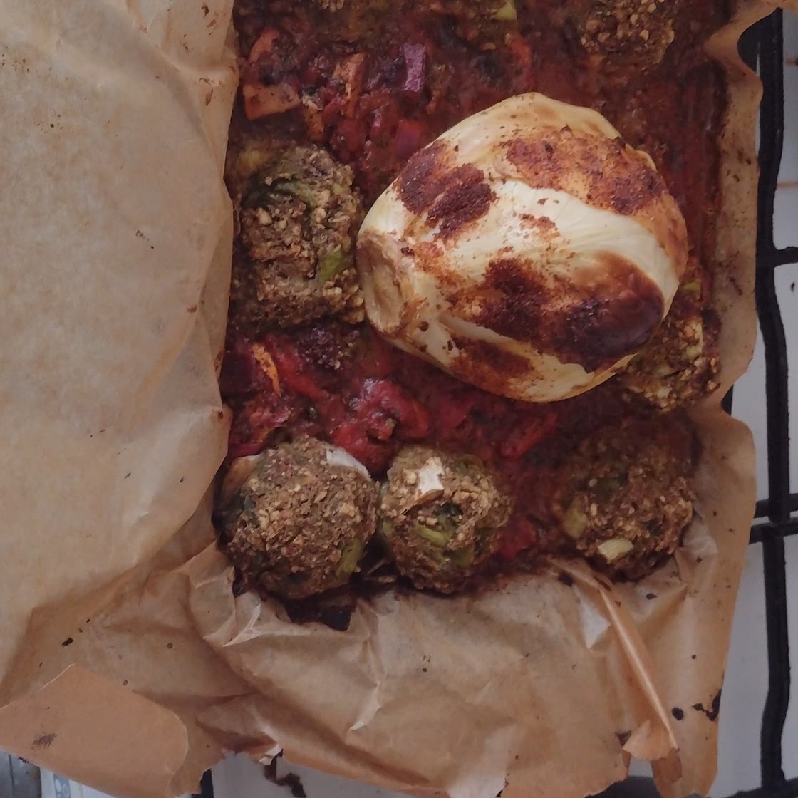 Harissa roast cabbage with stuffing balls and roast veg