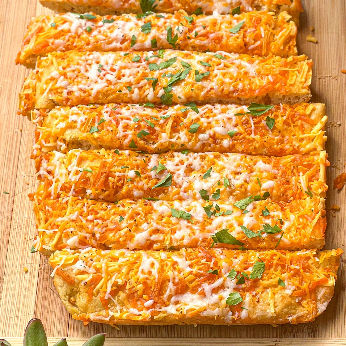 Cheesy Garlic Bread with Chili Oil drizzled on top. 