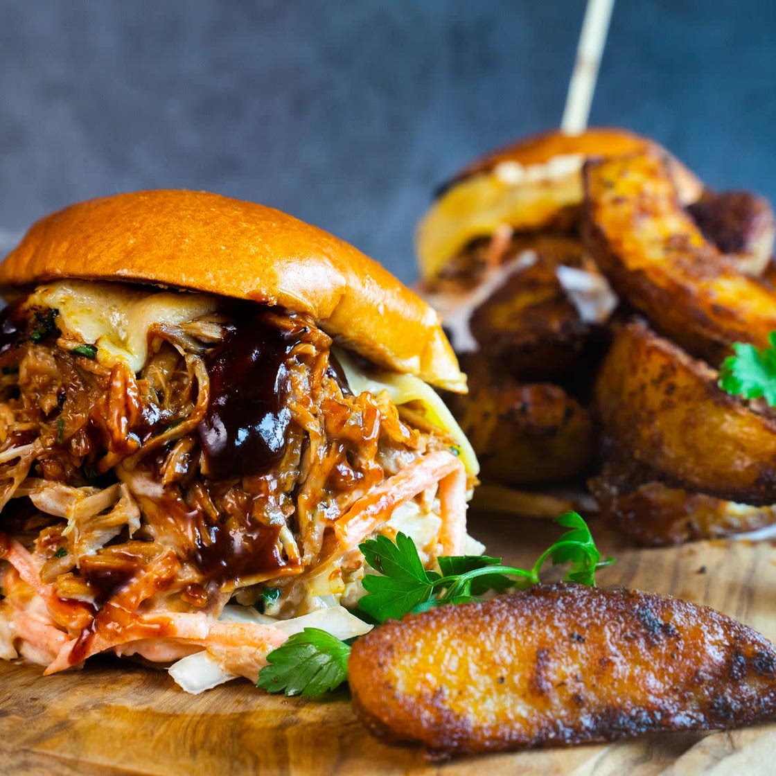 Pulled Pork Sandwich with creamy coleslaw and southern fried wedges