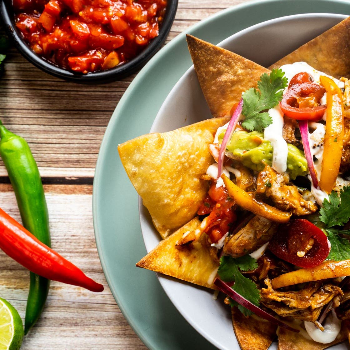 Chicken Fajita Loaded Nachos by Pureety