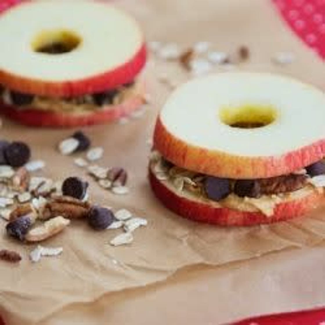 Apple sandwiches with granola and peanut butter