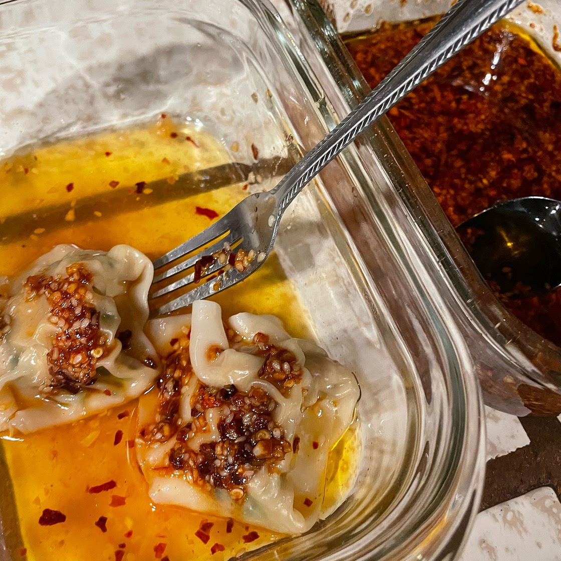 Sesame Ginger Dumplings in Chili Oil