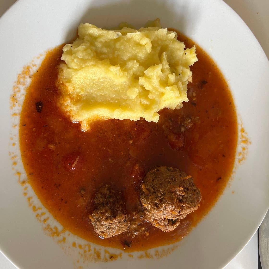 Fried Meat Balls in a Mezcal, chile ancho creamy red sauce