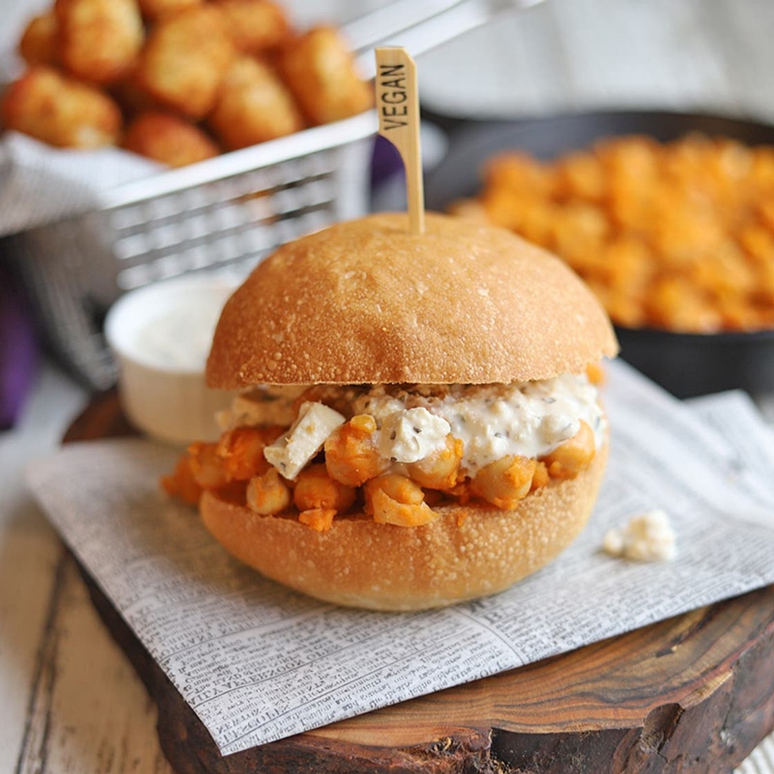 Buffalo chickpea sandwich with vegan blue cheese