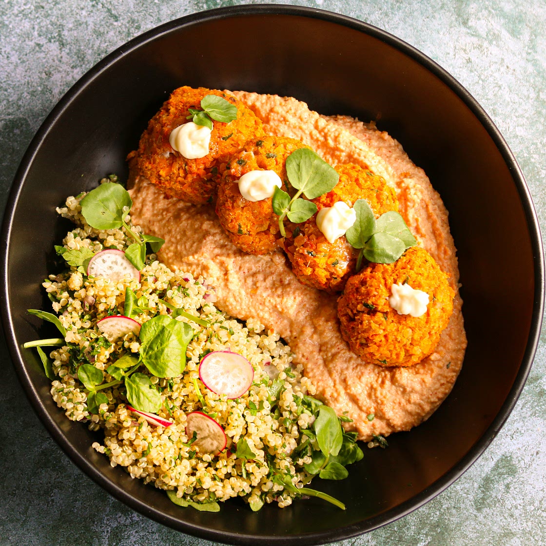 Carrot falafel with caramelised onion and paprika hummus and quinoa tabbouleh spring salad