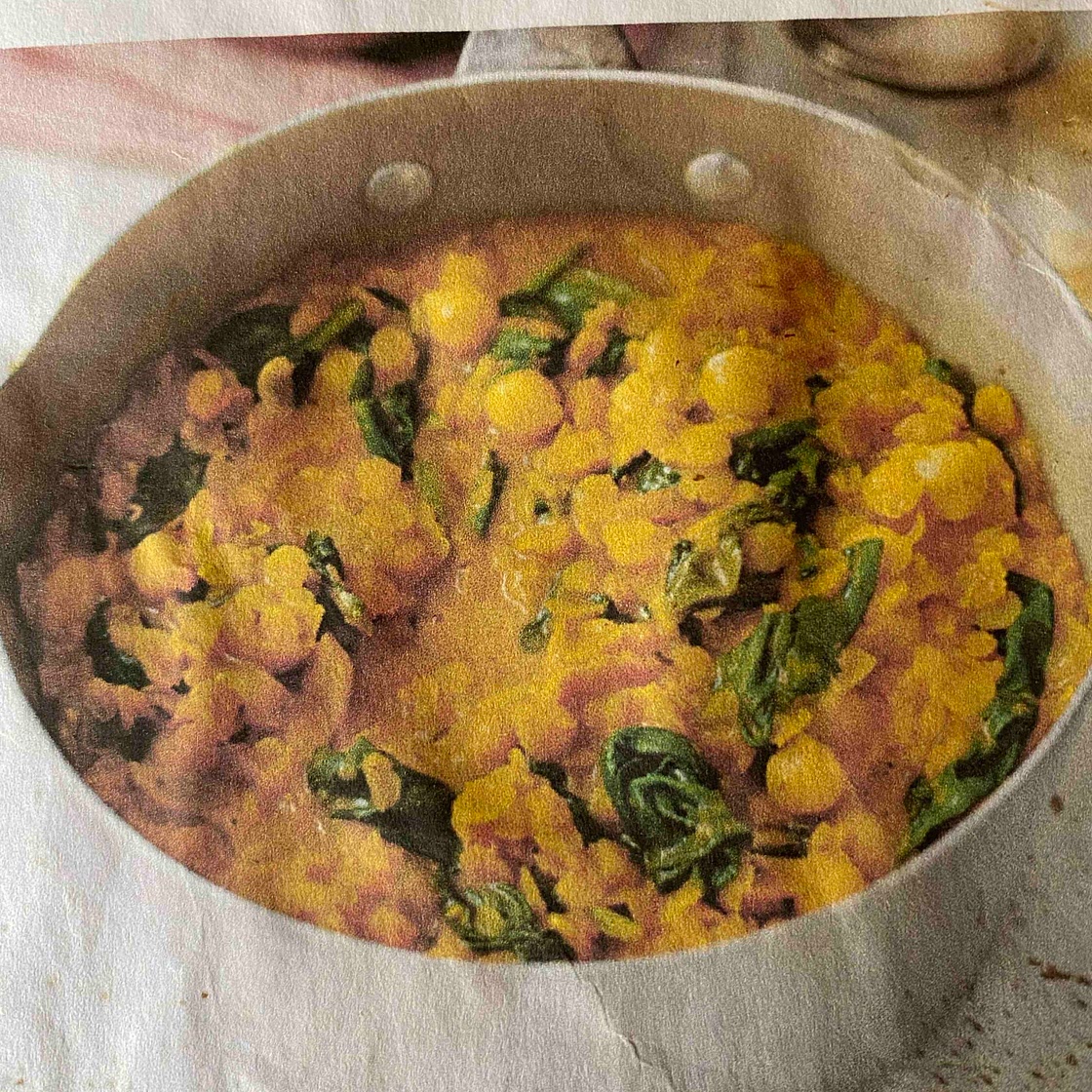 Coconut, spinach and lentil curry with naan bread