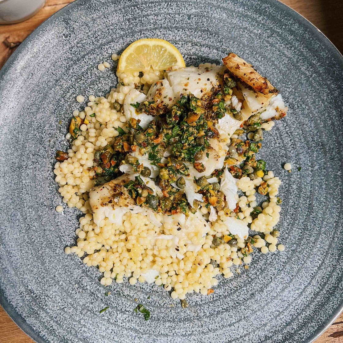 Baked Chilean Seabass with Pistachio Caper Salsa and Couscous