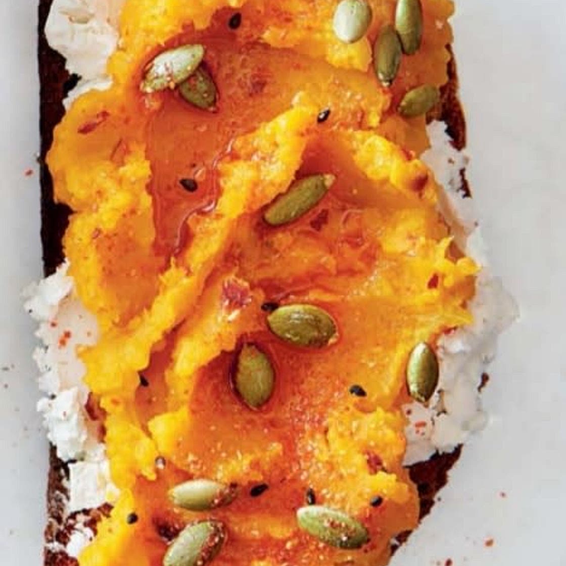 kabocha  squash  toasts  with  goat cheese  & pepitas