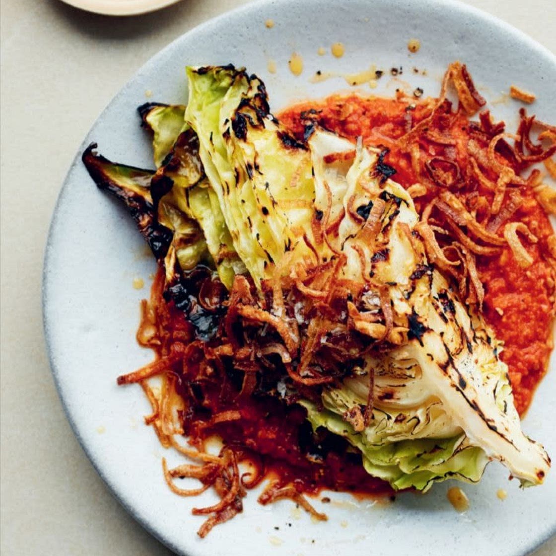 CHARRED HISPI CABBAGE WITH ROMESCO AND CRISPY SHALLOTS