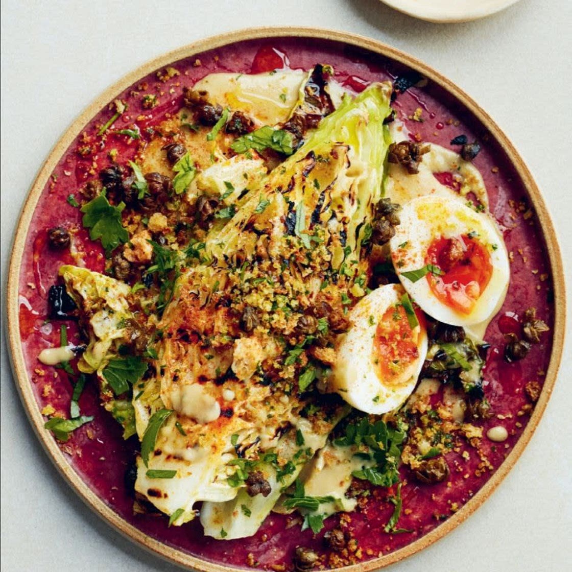 CHARRED HISPI CABBAGE WITH ANCHOVY SAUCE, SOFT EGGS, CRISPY CAPERS AND PANGRATTATO