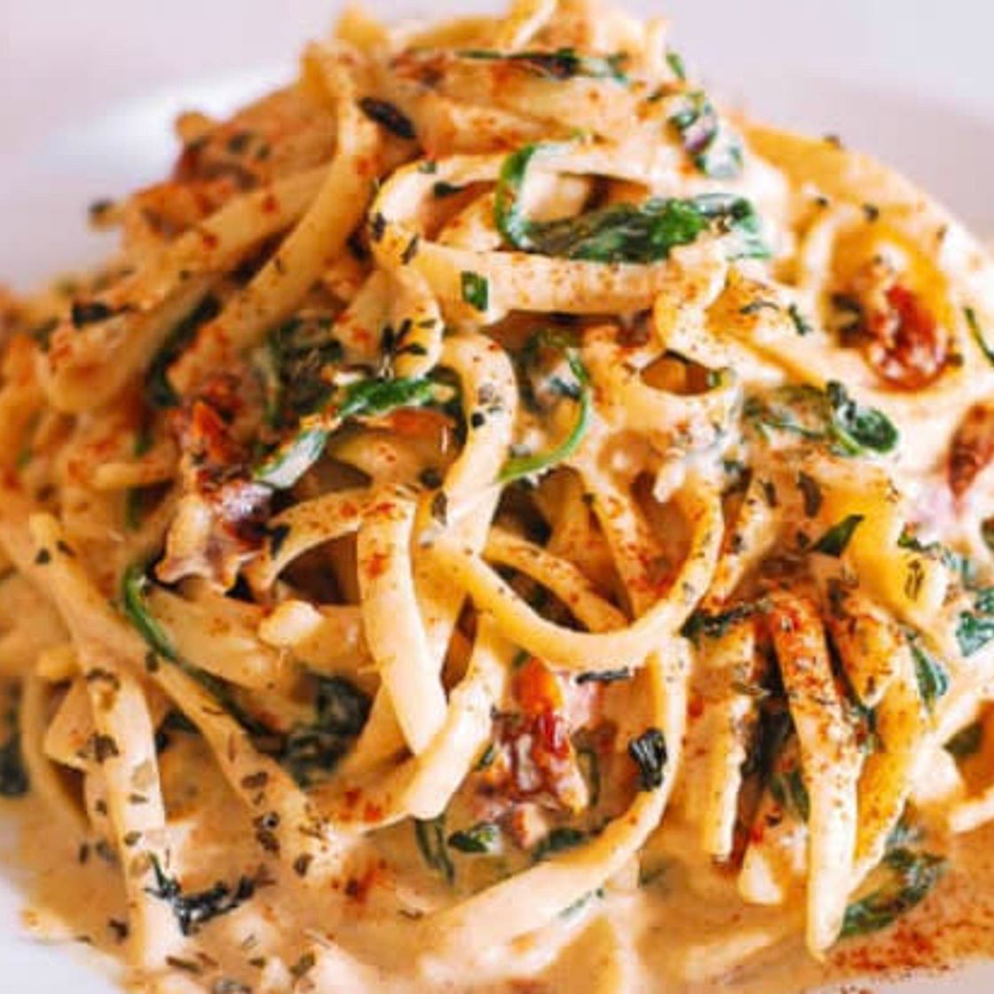 Linguine with spinach and sun-dried tomato cream sauce