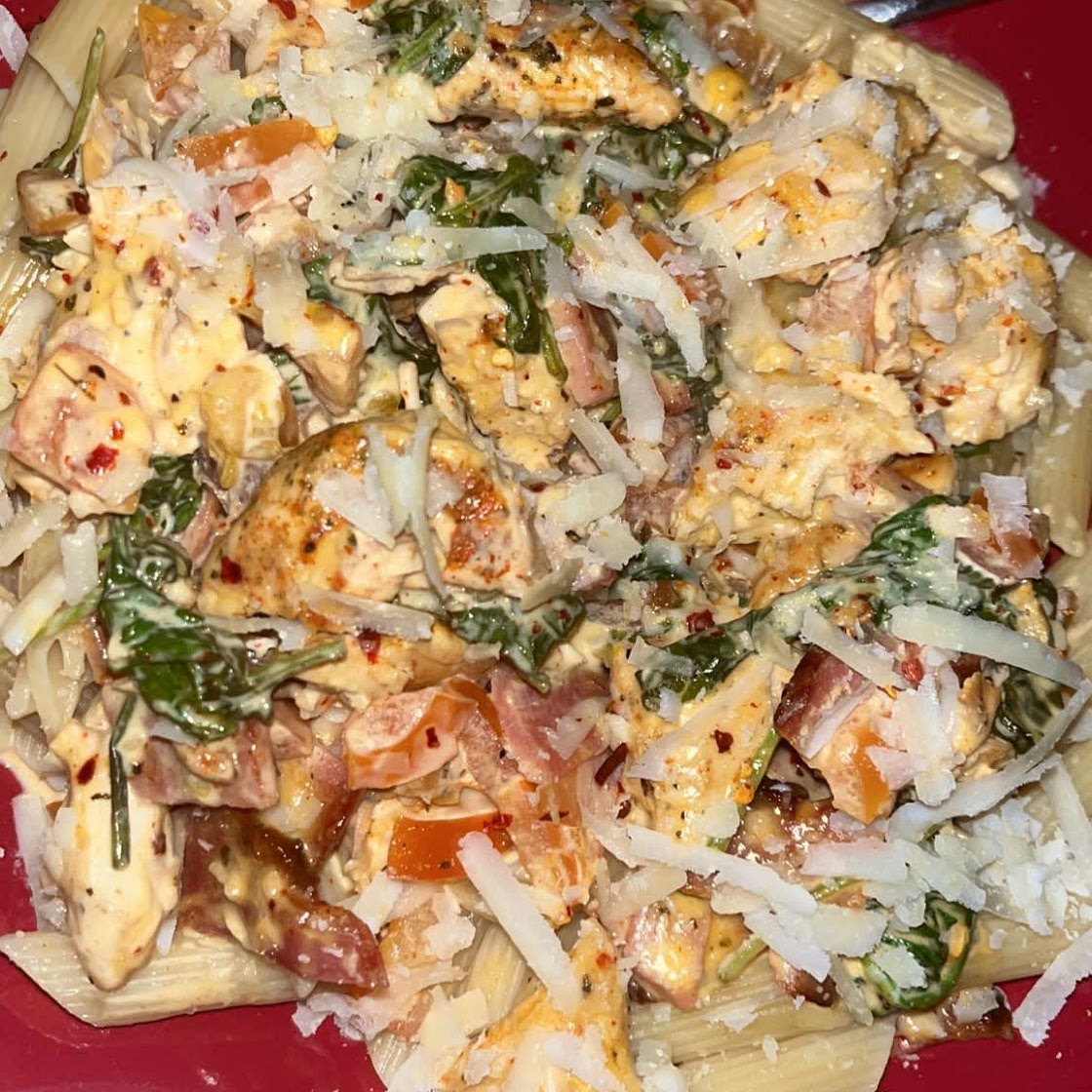 Chicken and Bacon Pasta with Spinach and Tomatoes in Garlic Cream Sauce