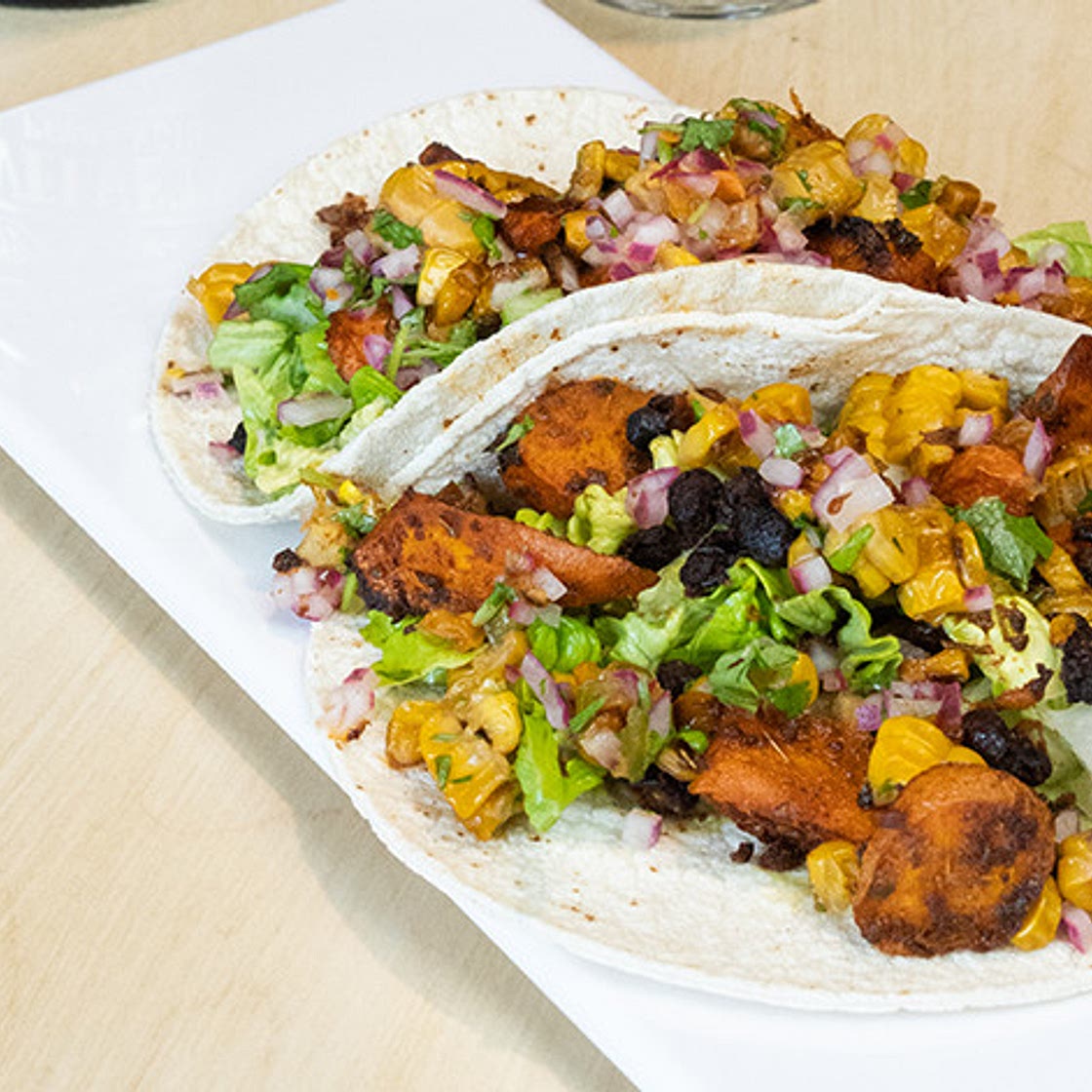 Smoky Carrot and Black Bean Tacos with Corn and Jalapeno Salsa